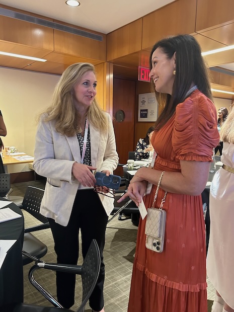 The Bridelle Collective's Kendra Bridelle talking to a fellow delegate during the morning networking break at Luxury Roundtable's Luxury Women Leaders Summit New York June 13