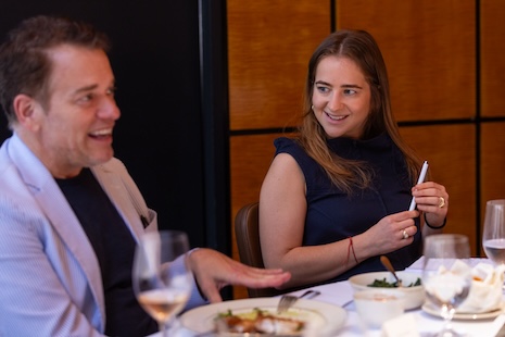 Douglas Elliman's Scott Durkin talking luxury property at the Heesen Yachts x Luxury Roundtable Luncheon June 19 in New York. Busness Insider's Maddie Berg is amused! Image: Jonathan Heisler